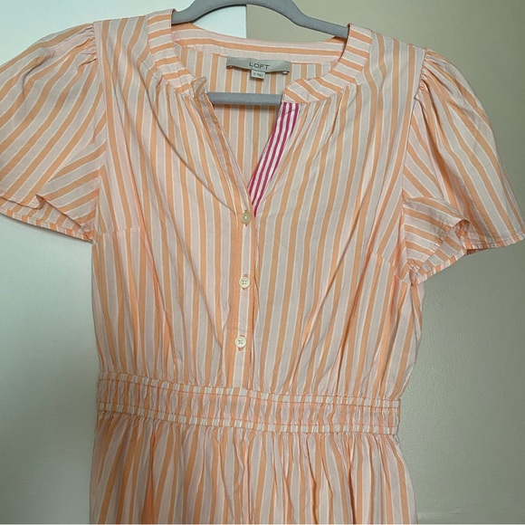 A dress with stripes. I am 5’2 and it is a midi dress on me. - Picture 4 of 4